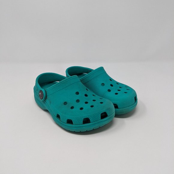 teal kids crocs